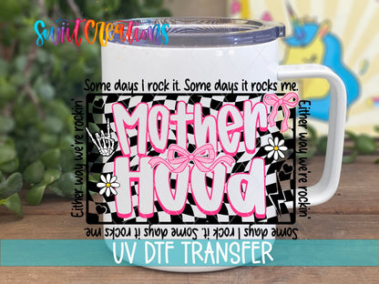 Motherhood UV DTF transfer on a white stainless steel mug with a lid