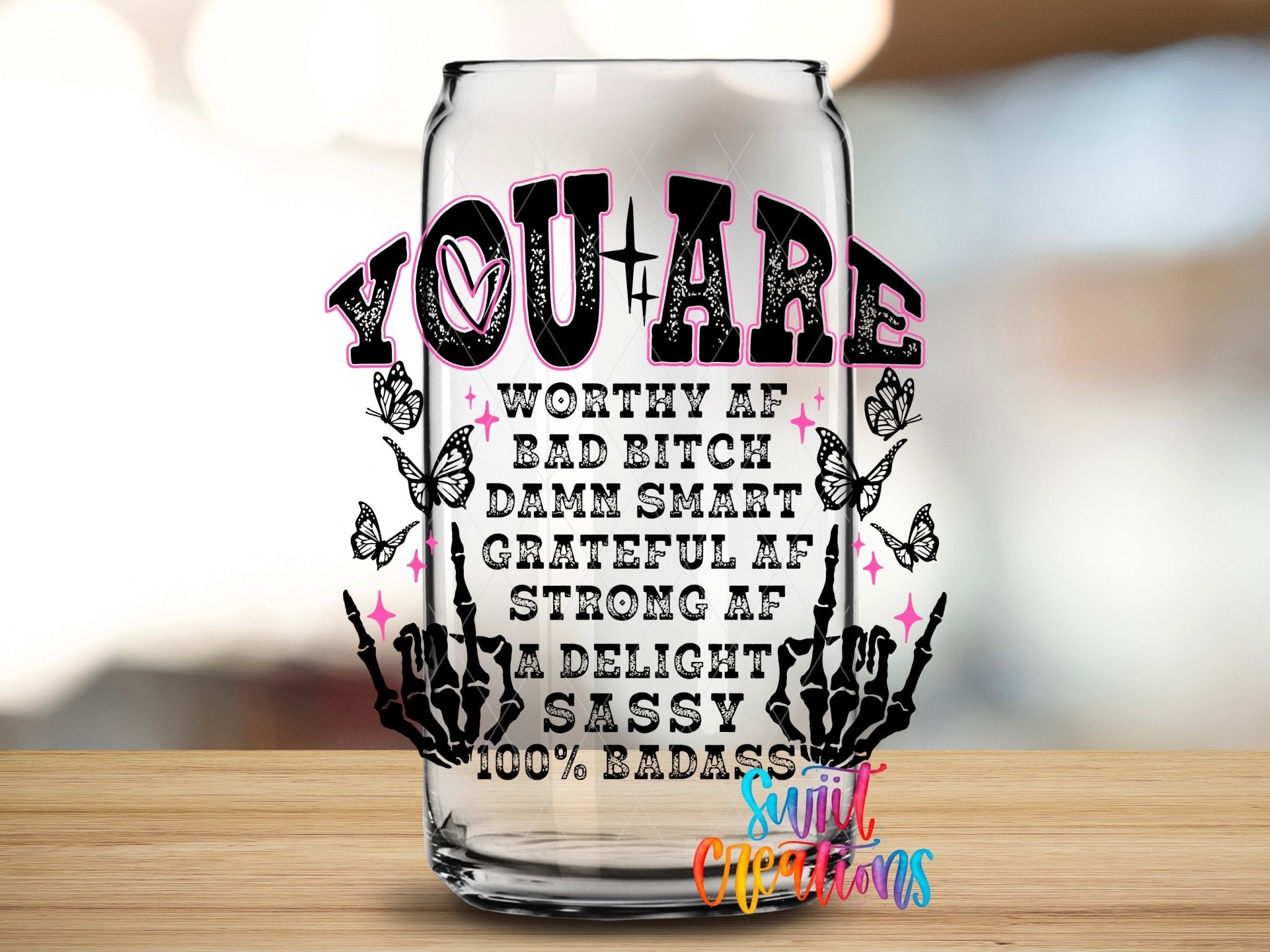 Inspirational You Are a Badass UV DTF transfer applied to a clear glass can from Swiit Creations