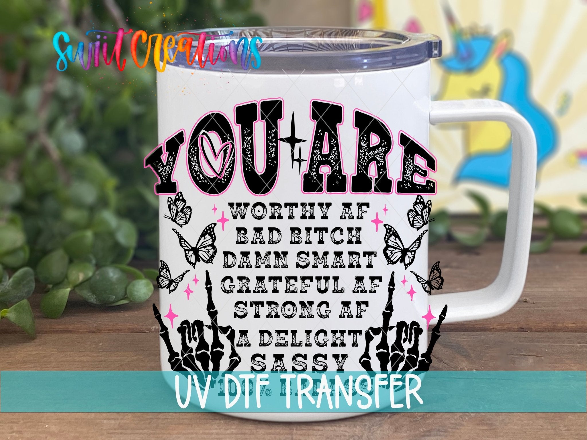 Inspirational You Are a Badass UV DTF transfer displayed on a white coffee mug from Swiit Creations