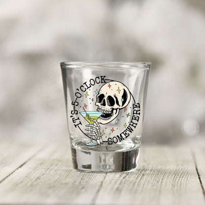 Close-up of the It's 5 O'Clock Somewhere UV DTF transfer on a clear shot glass