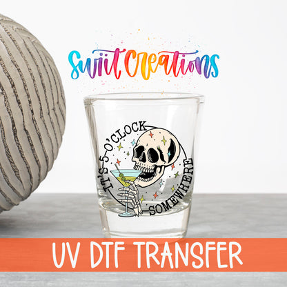 It's 5 O'Clock Somewhere UV DTF transfer on a clear shot glass with the Swiit Creations logo and UV DTF Transfer banner
