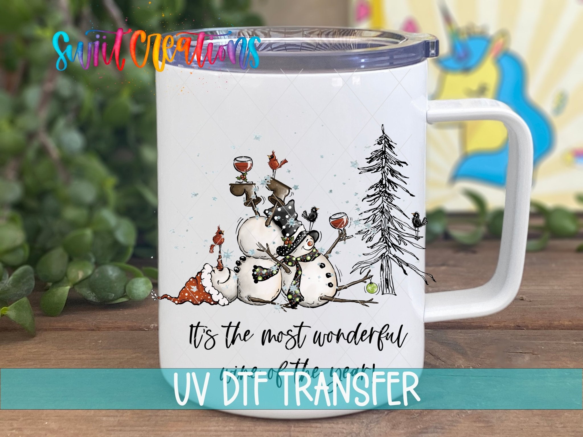 Swiit Creations UV DTF Wonderful Wine of the Year Snowman transfer displayed on a white coffee mug