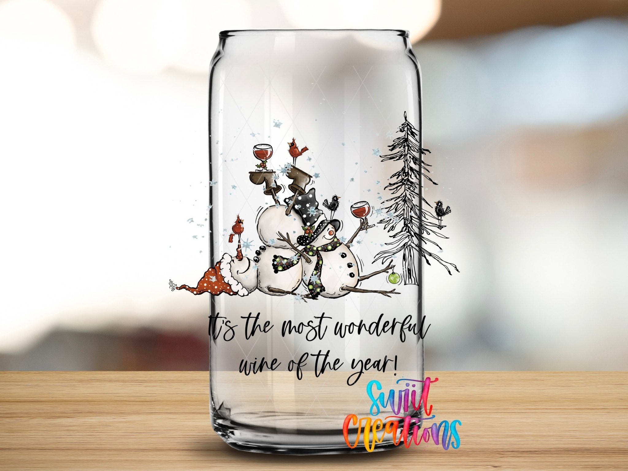 Swiit Creations UV DTF Wonderful Wine of the Year Snowman transfer applied to a clear glass can