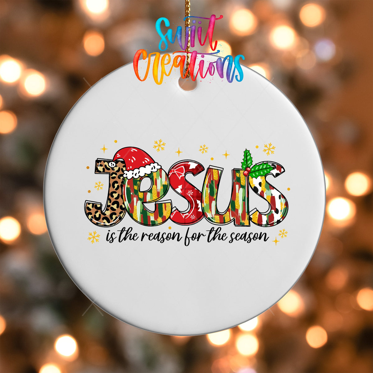 Close-up of the Jesus Is the Reason for the Season UV DTF transfer on a round white ornament