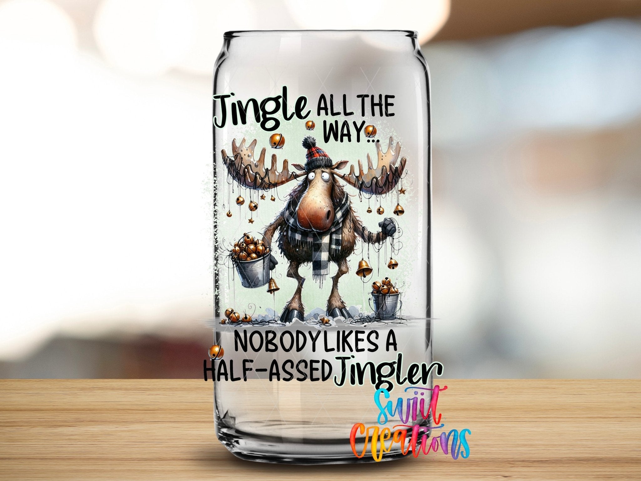 Swiit Creations UV DTF Jingle All The Way Moose Christmas transfer applied to a clear glass can