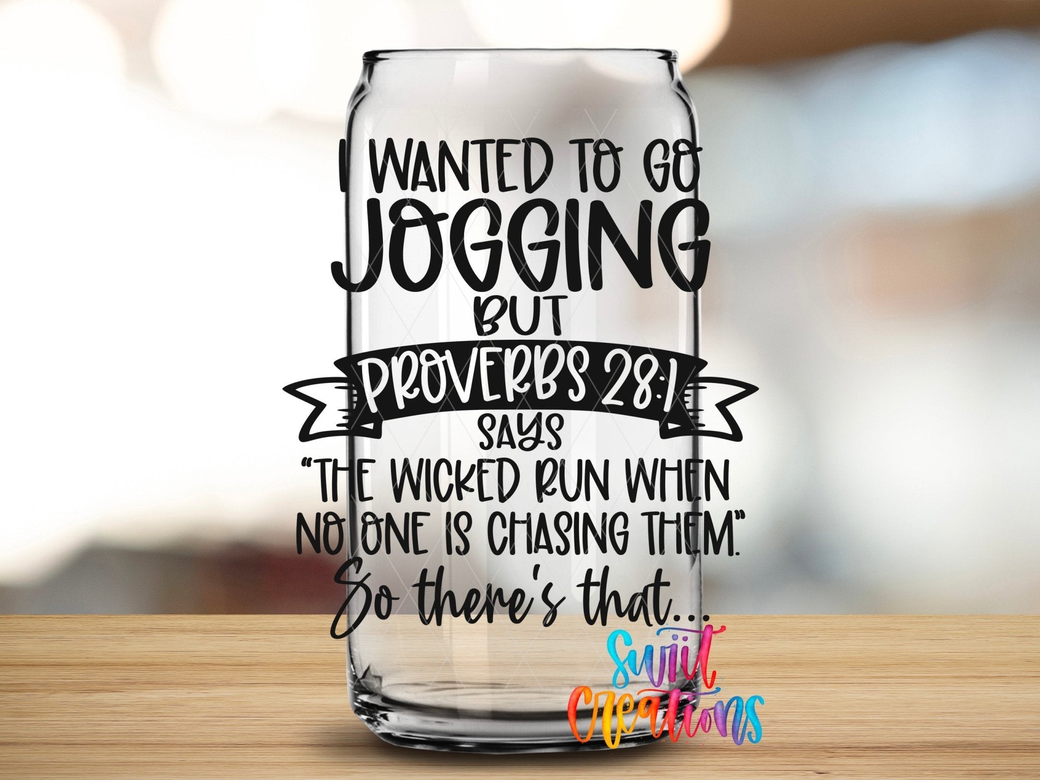 Jogging Funny Proverbs Christian Humor UV DTF transfer applied to a clear glass can from Swiit Creations