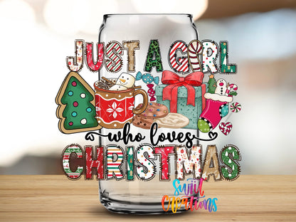 Close-up of the Just a Girl Who Loves Christmas UV DTF transfer on a clear glass can