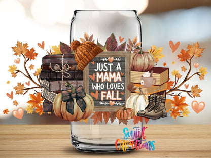 Close-up of the Just a Mama Who Loves Fall UV DTF full wrap on a clear glass can