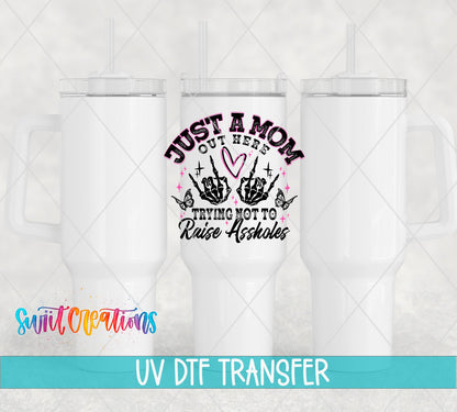 Just a Mom Out Here UV DTF transfer on white 40 oz tumblers