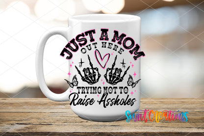 Just a Mom Out Here UV DTF transfer on a white ceramic coffee mug