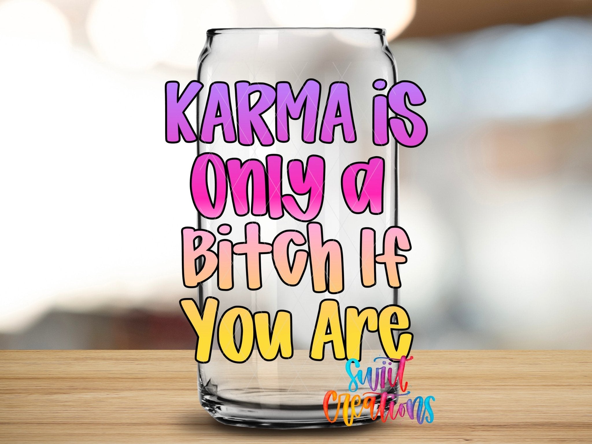 Karma Is Only A Bitch If You Are UV DTF transfer applied to a clear glass can from Swiit Creations