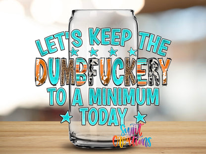 Close-up of the Let's Keep the Dumbf*ckery to a Minimum UV DTF wrap on a clear glass can