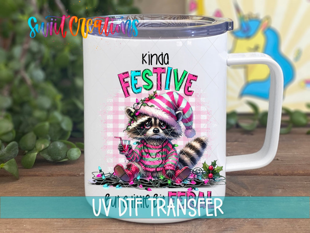 Kinda Festive But a Little Bit Feral UV DTF transfer on a white stainless steel mug with a lid