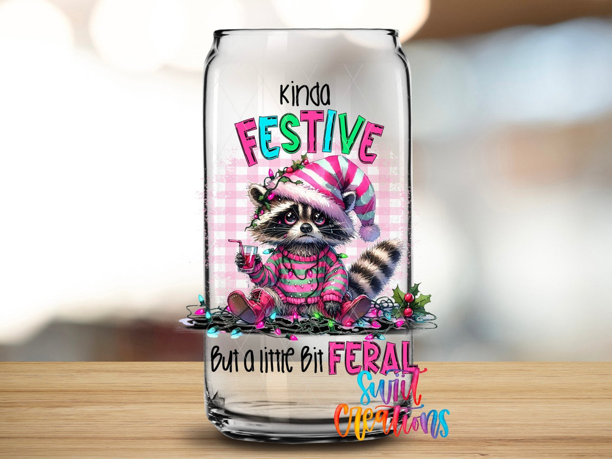 Close-up of the Kinda Festive But a Little Bit Feral UV DTF transfer on a clear glass can