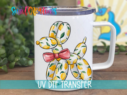 Balloon Dog lemons and pink bow UV DTF transfer on a white stainless steel mug with a lid