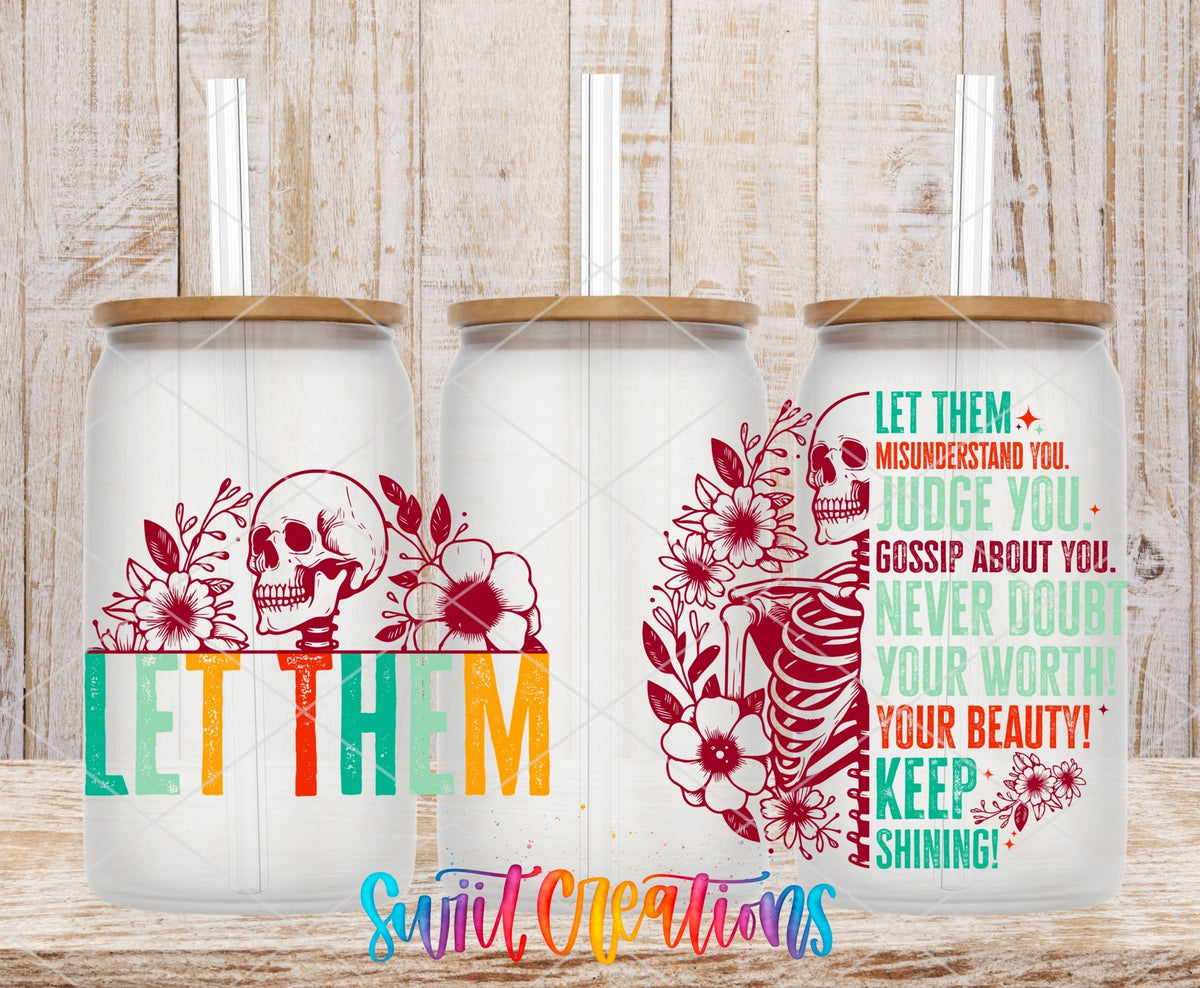 Let Them UV DTF wrap on three clear glass cans with bamboo lids