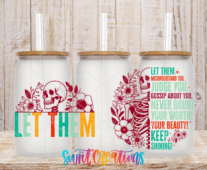 Let Them UV DTF wrap on three clear glass cans with bamboo lids