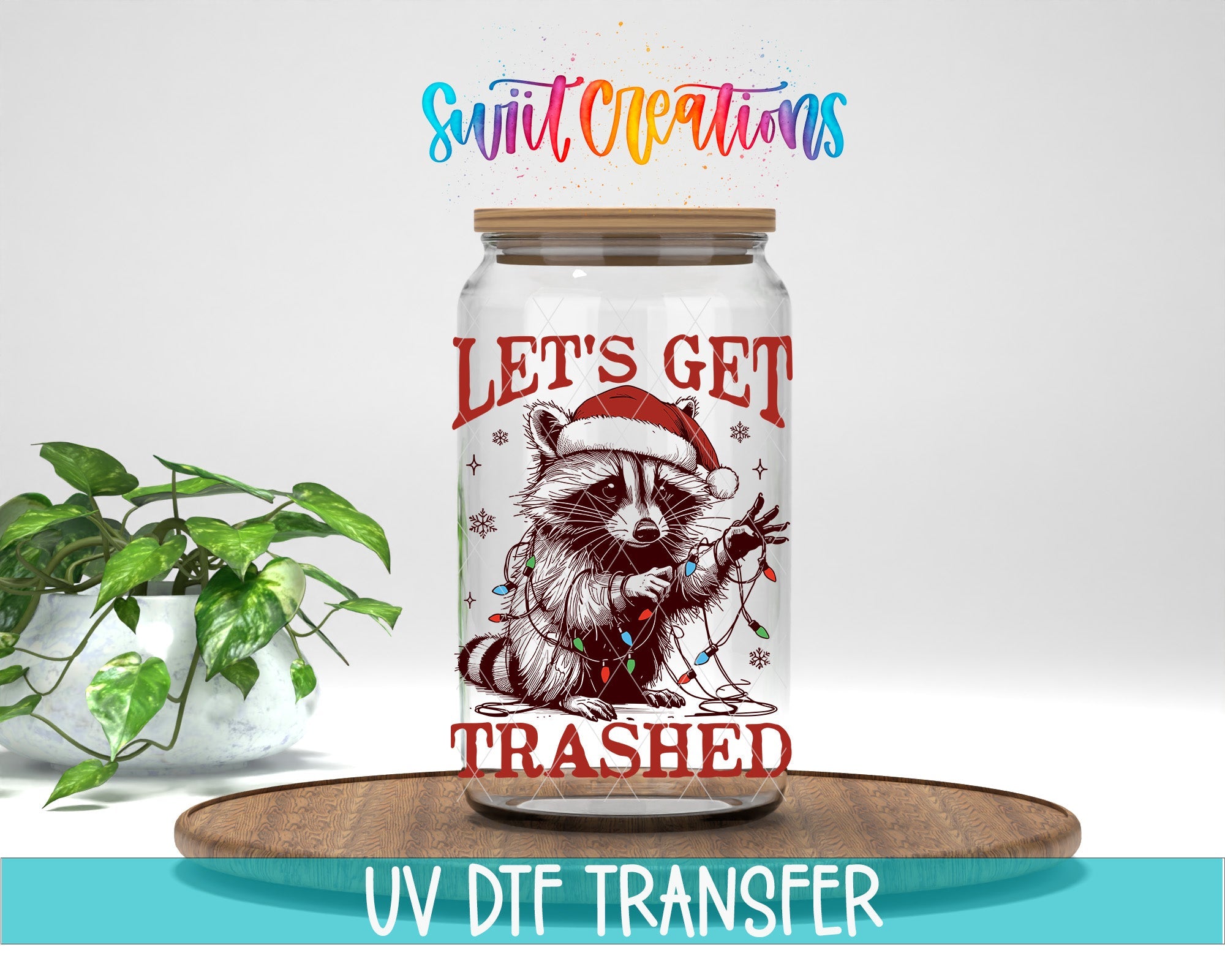 Swiit Creations UV DTF Let’s Get Trashed Christmas Raccoon transfer displayed on a clear jar mockup