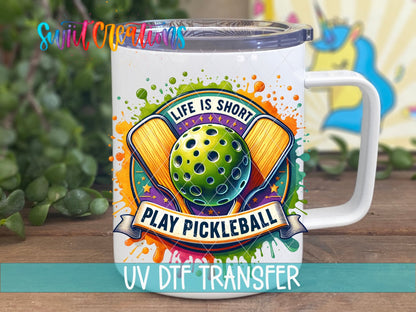 Life Is Short Play Pickleball Sports Paddle And Ball Design UV DTF transfer displayed on a white coffee mug from Swiit Creations