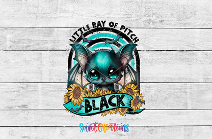 Little Ray of Pitch Black UV DTF transfer artwork on a white wood background