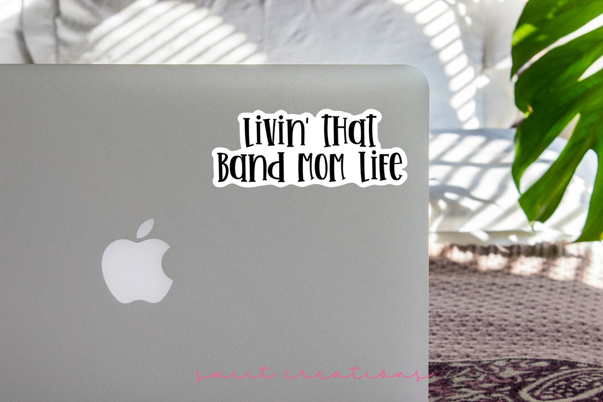 Black Band Mom Life sticker on the lid of a silver laptop
