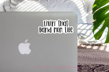Black Band Mom Life sticker on the lid of a silver laptop