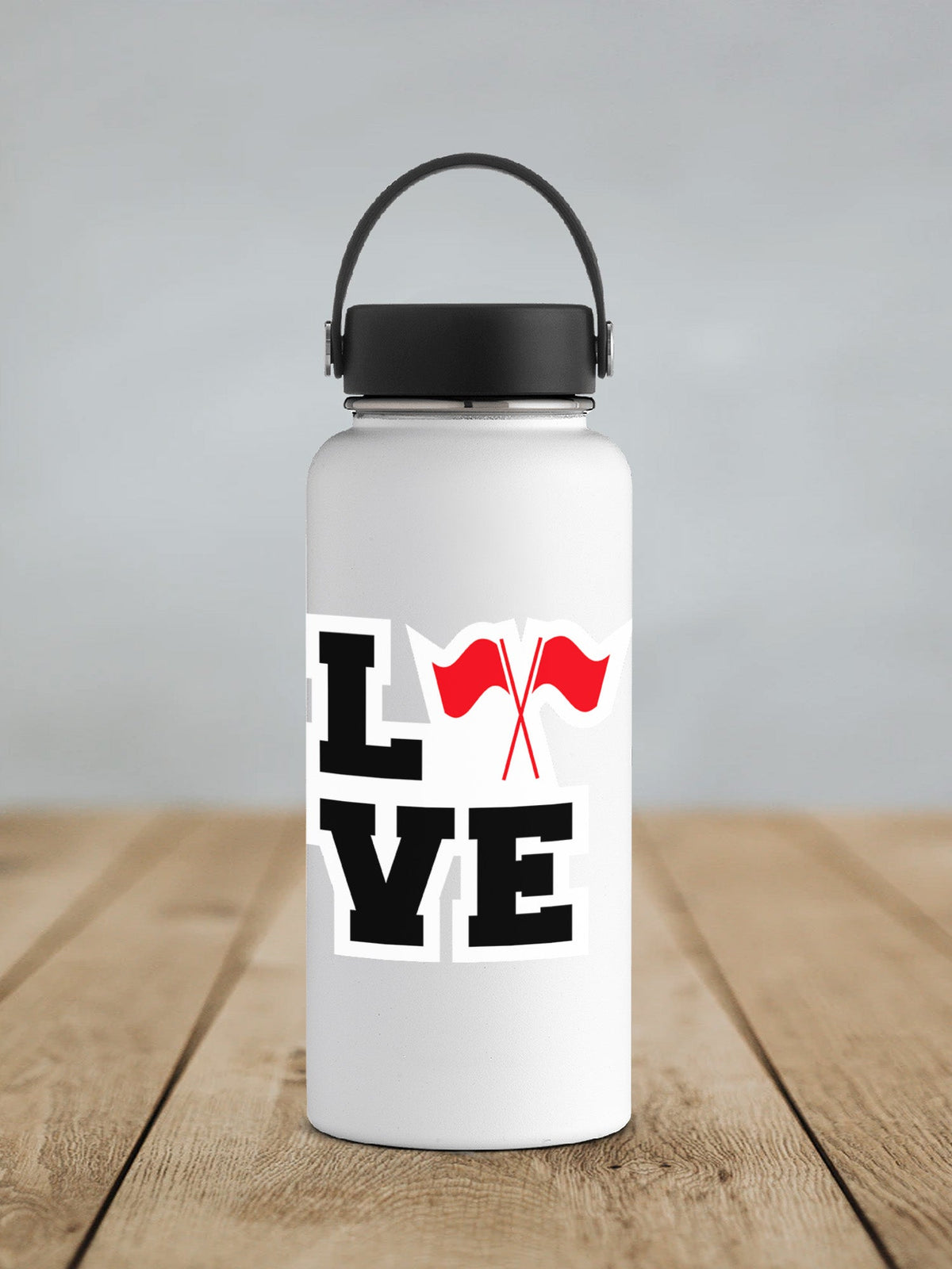 Red Love Color Guard sticker on a white insulated water bottle