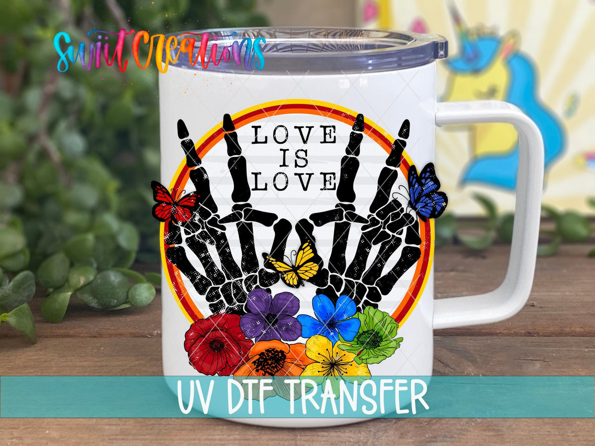 Love Is Love UV DTF transfer on a white stainless steel mug with a lid