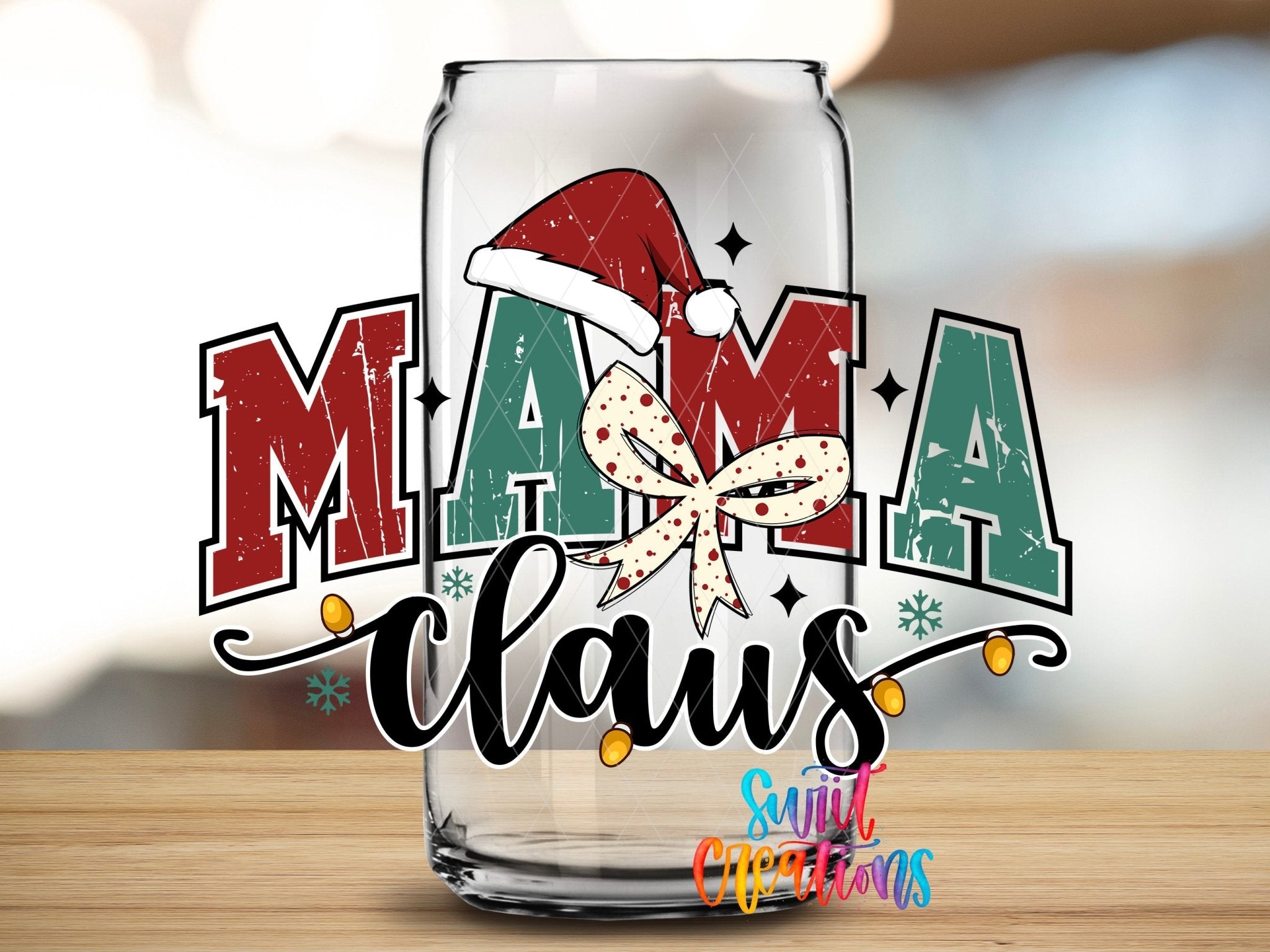 Swiit Creations UV DTF Mama Claus Christmas transfer applied to a clear glass can