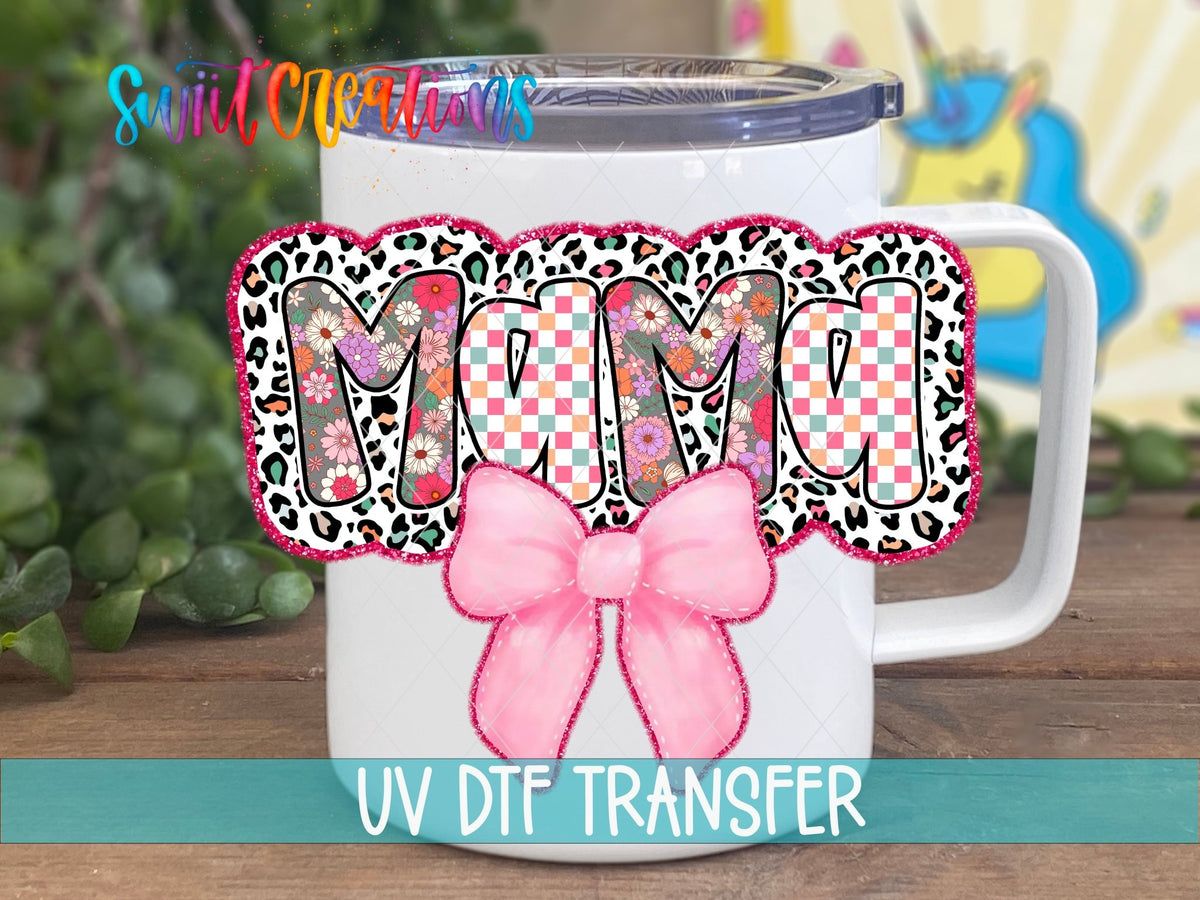 Mama leopard letters and pink bow UV DTF transfer on a white stainless steel mug with a lid