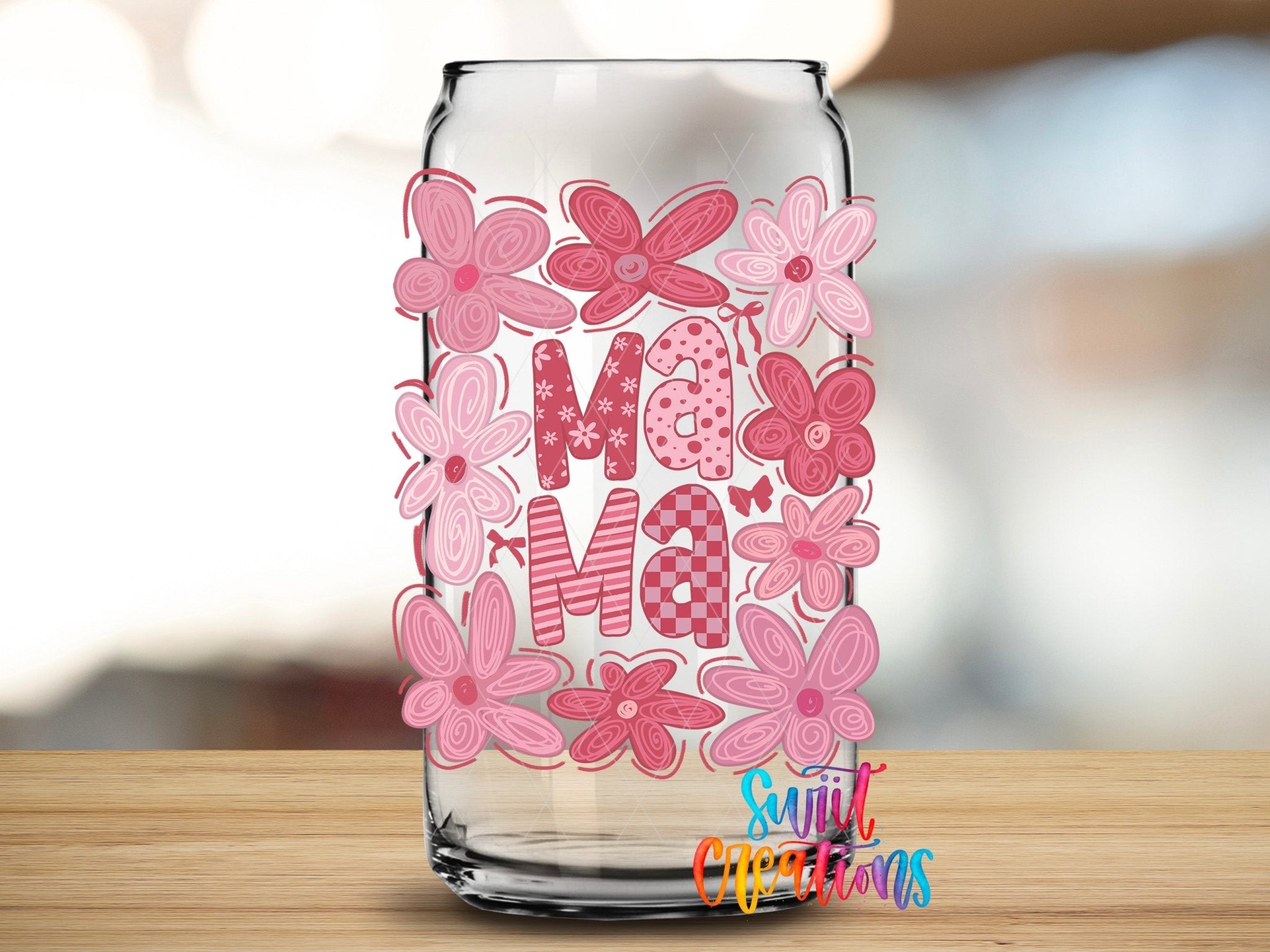 Mama UV DTF transfer applied to a clear glass can from Swiit Creations