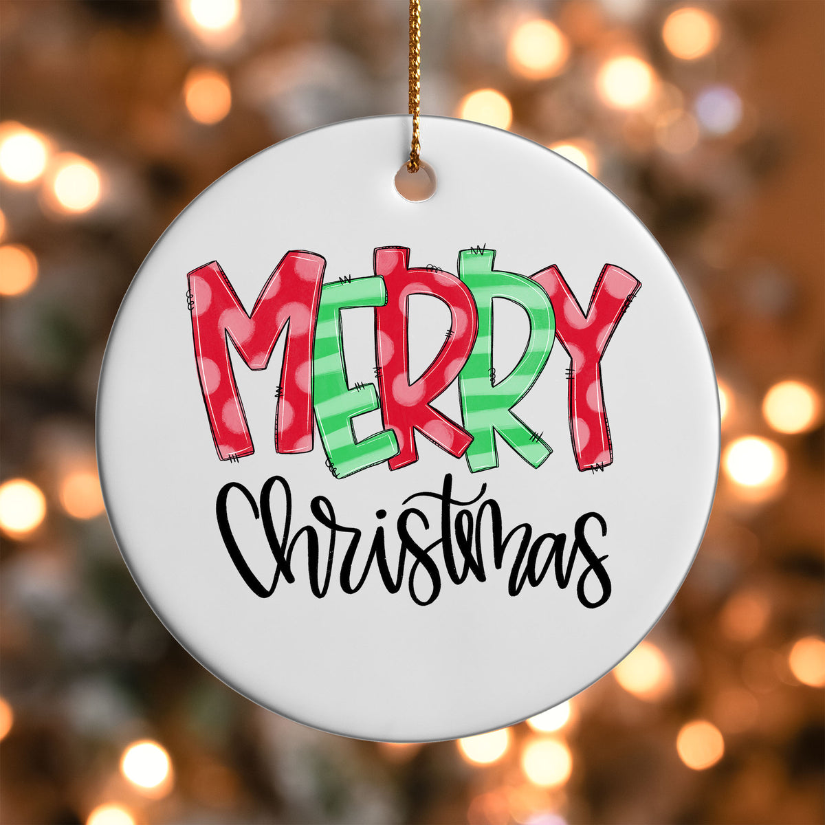 Merry Christmas Candy Stripe ornament UV DTF transfer on a round white ornament with a bokeh light background