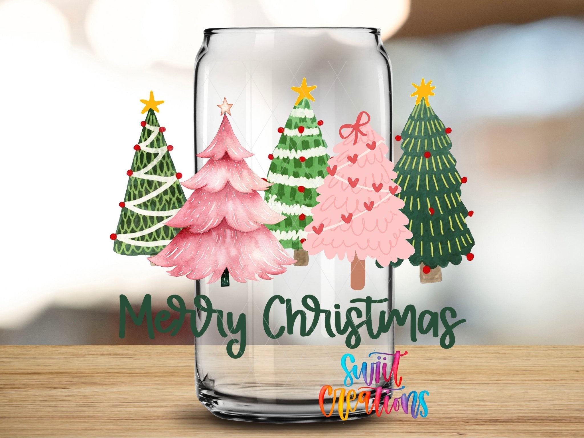 Swiit Creations UV DTF Merry Christmas Pink And Green Trees transfer applied to a clear glass can