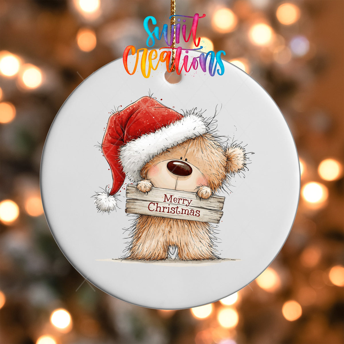 Close-up of the Merry Christmas Teddy Bear UV DTF transfer on a round white ornament