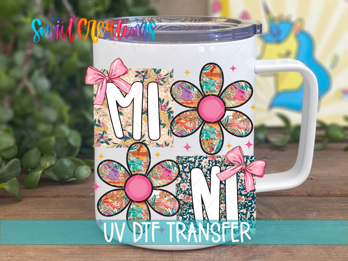 Mini patchwork daisy UV DTF transfer on a white stainless steel mug with a lid