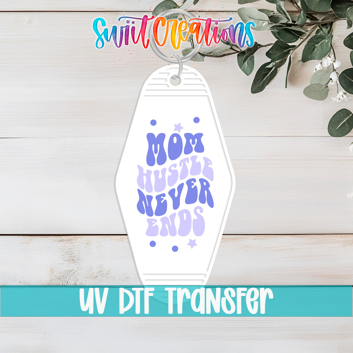 Mom Hustle Never Ends motel keychain UV DTF transfer flat lay mockup by Swiit Creations