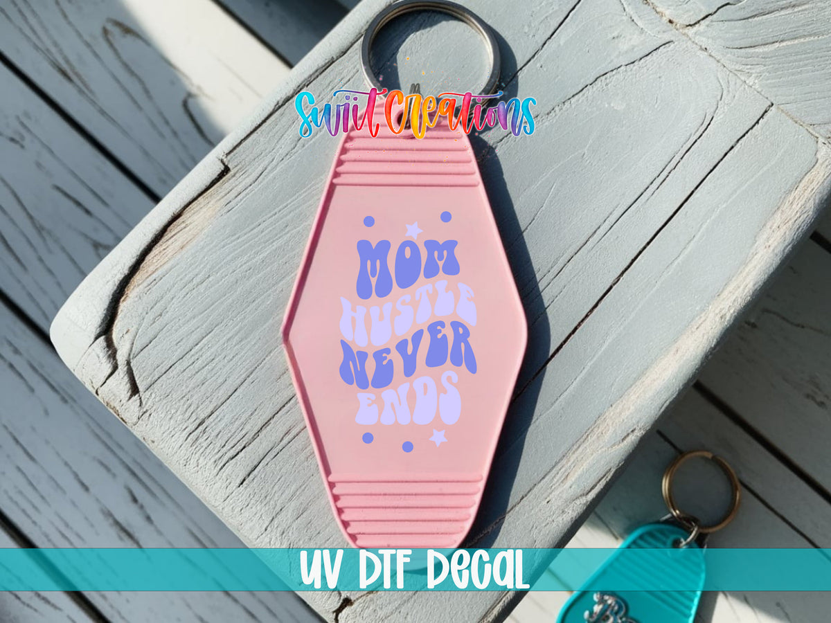 Mom Hustle Never Ends motel keychain UV DTF transfer colored keychain mockup by Swiit Creations