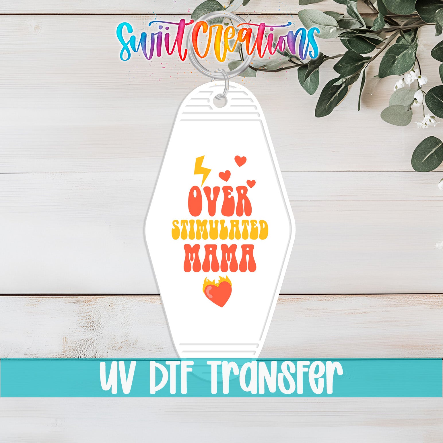 Overstimulated Mama motel keychain UV DTF transfer flat lay mockup by Swiit Creations