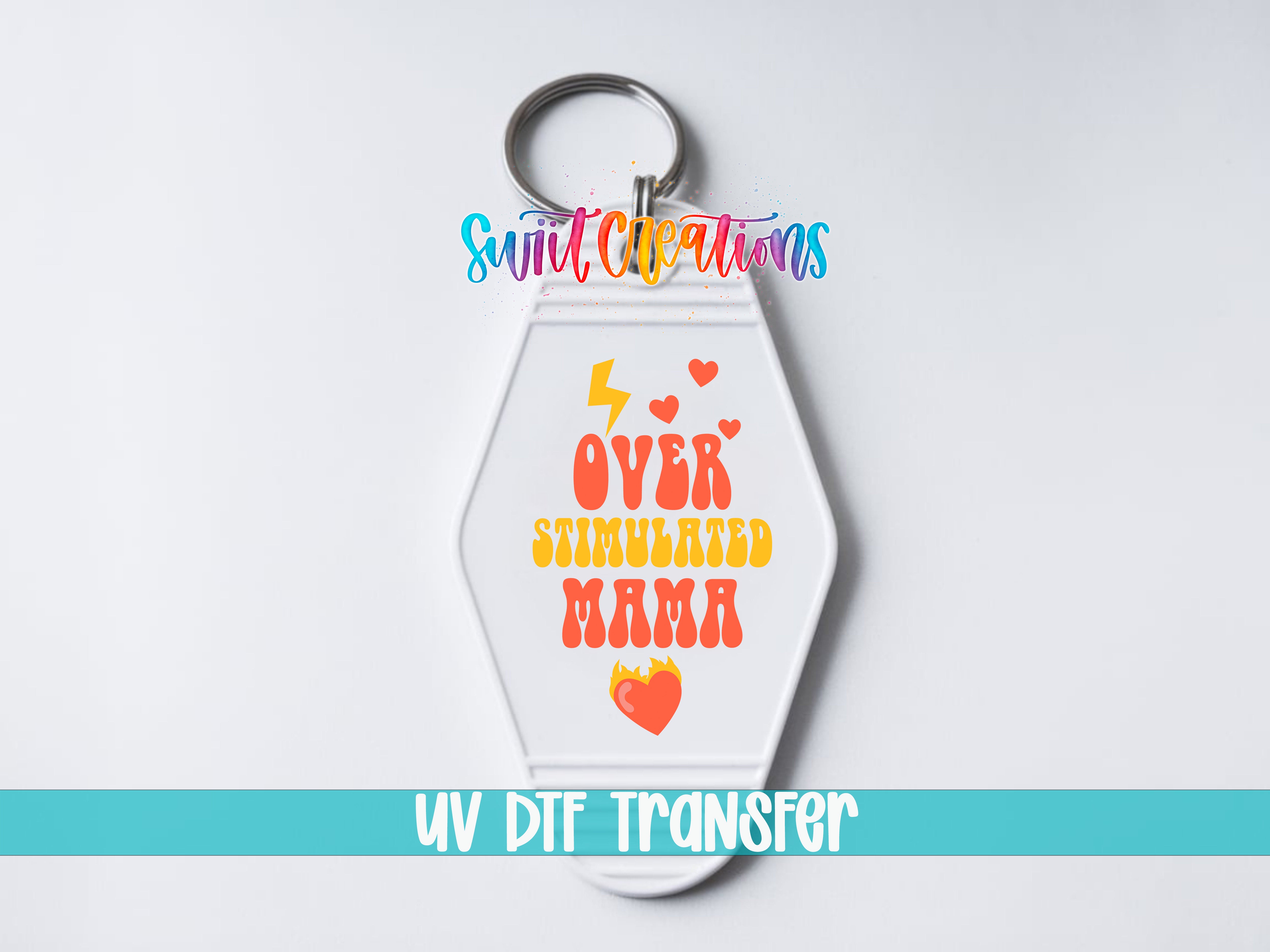 Overstimulated Mama motel keychain UV DTF transfer close-up mockup by Swiit Creations