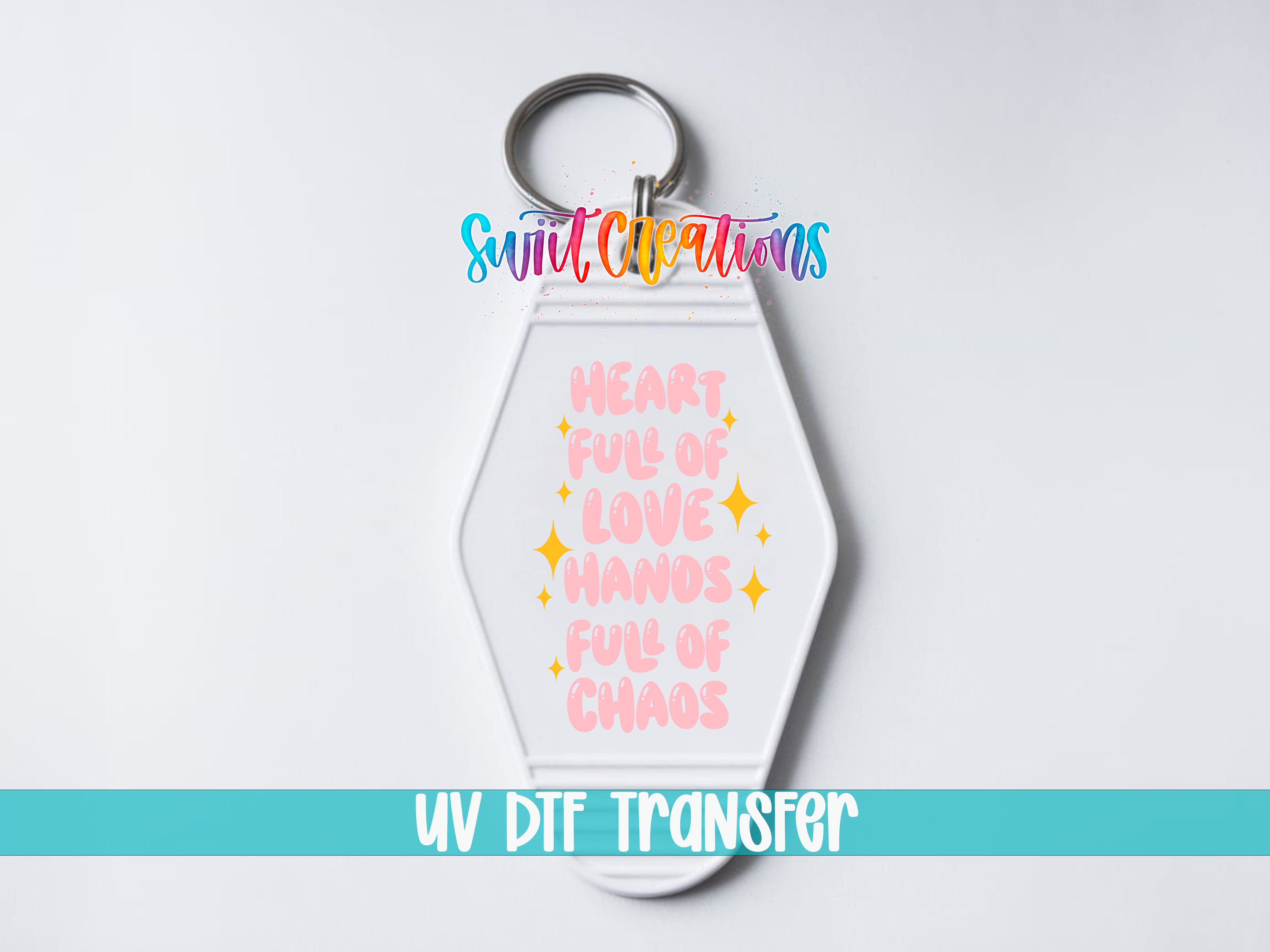 Heart Full of Love Hands Full of Chaos motel keychain UV DTF transfer close-up mockup by Swiit Creations