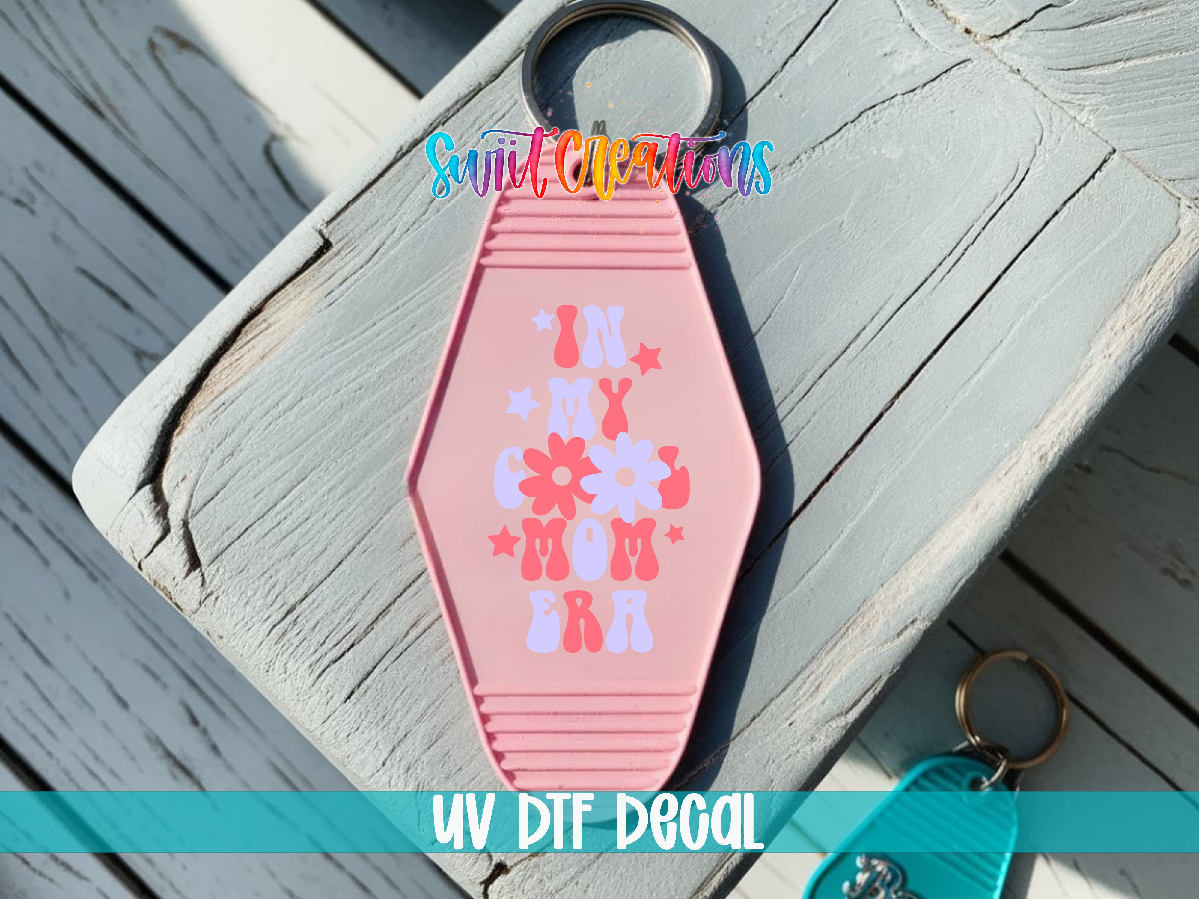 In My Cool Mom Era motel keychain UV DTF transfer colored keychain mockup by Swiit Creations
