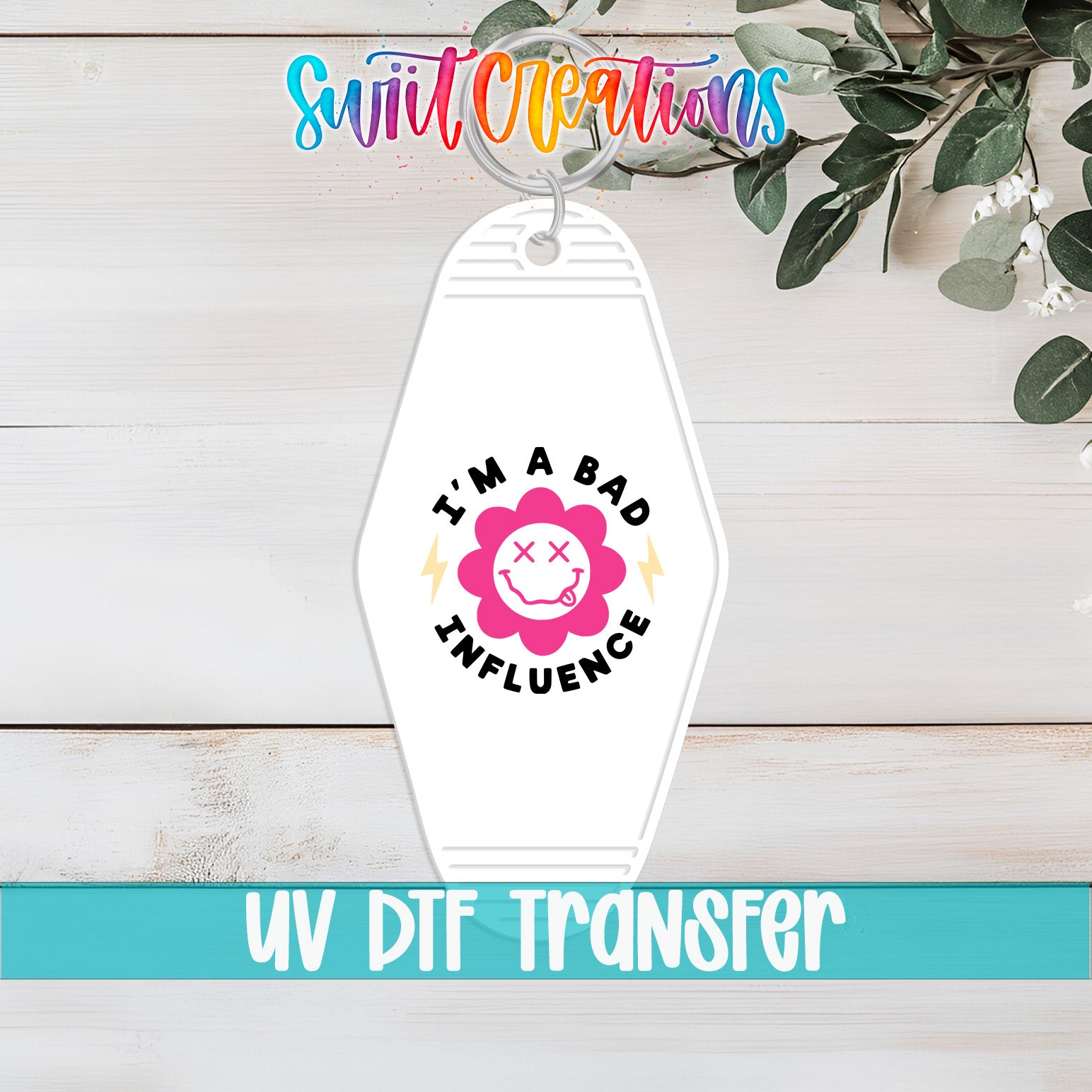 I’m a Bad Influence motel keychain UV DTF transfer flat lay mockup by Swiit Creations