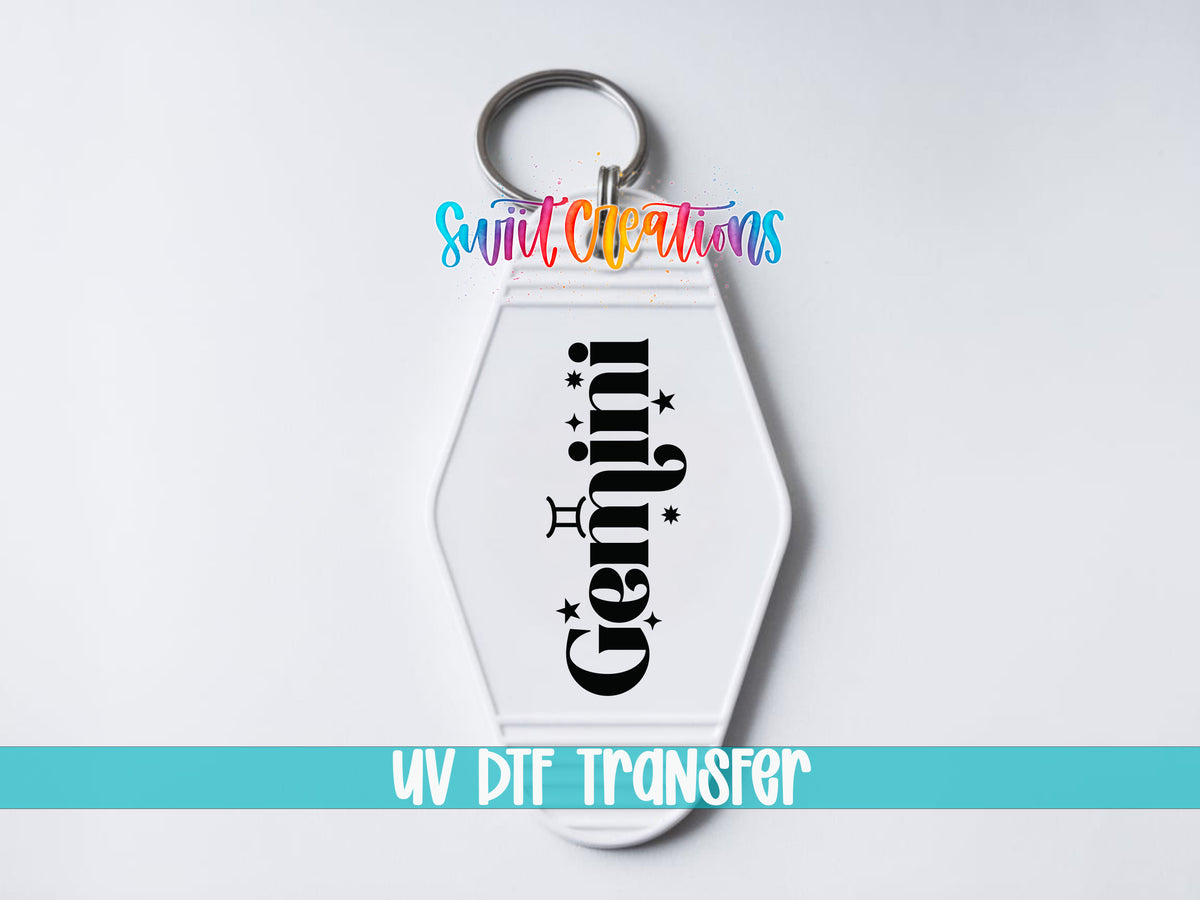Gemini motel keychain UV DTF transfer close-up mockup by Swiit Creations