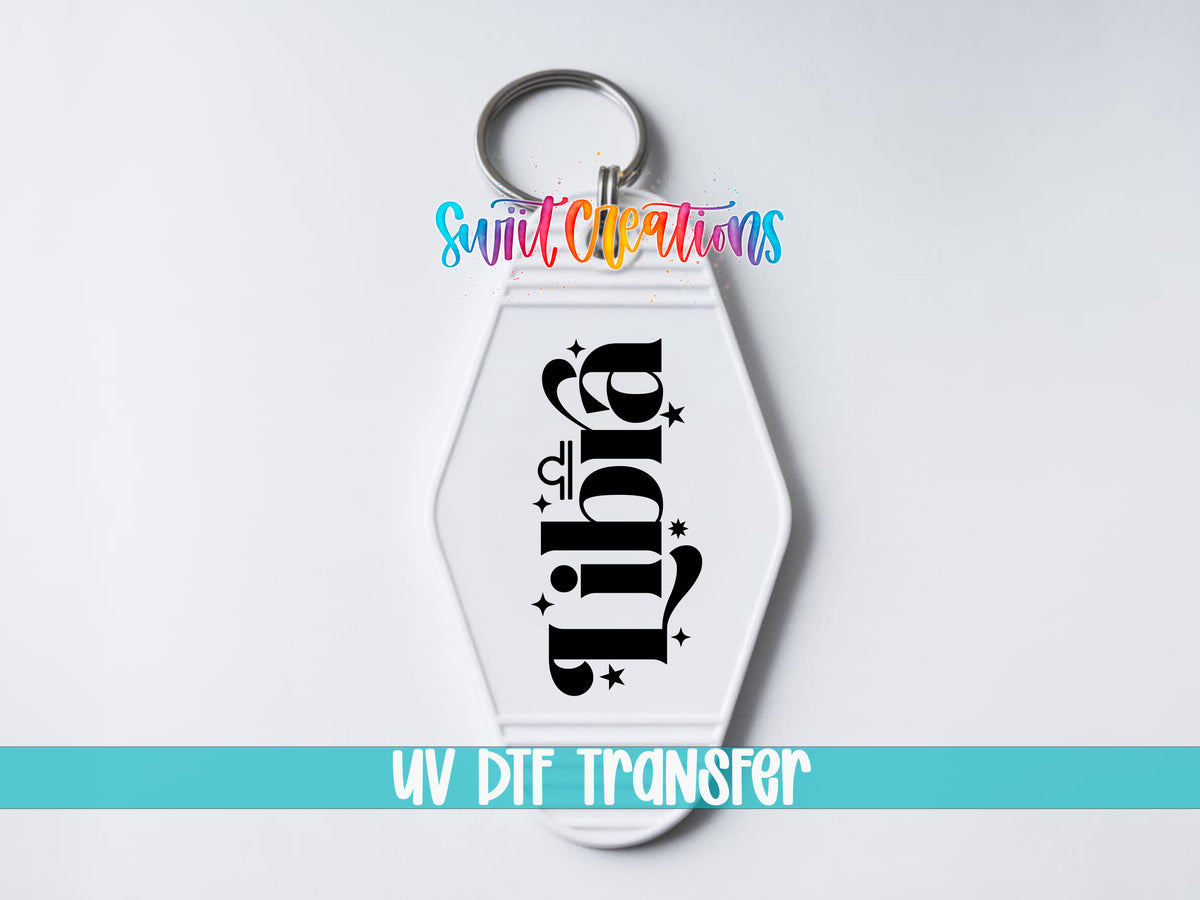 Libra motel keychain UV DTF transfer close-up mockup by Swiit Creations