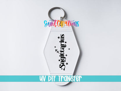 Sagittarius motel keychain UV DTF transfer close-up mockup by Swiit Creations