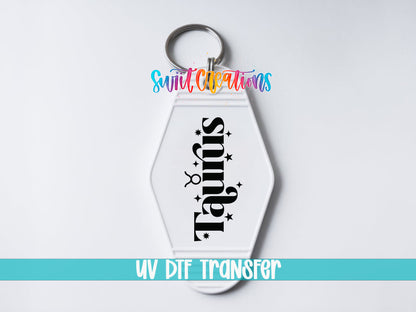 Taurus motel keychain UV DTF transfer close-up mockup by Swiit Creations