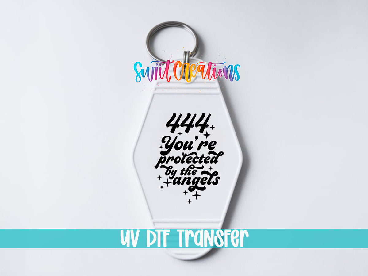 444 You’re Protected by the Angels motel keychain UV DTF transfer close-up mockup by Swiit Creations