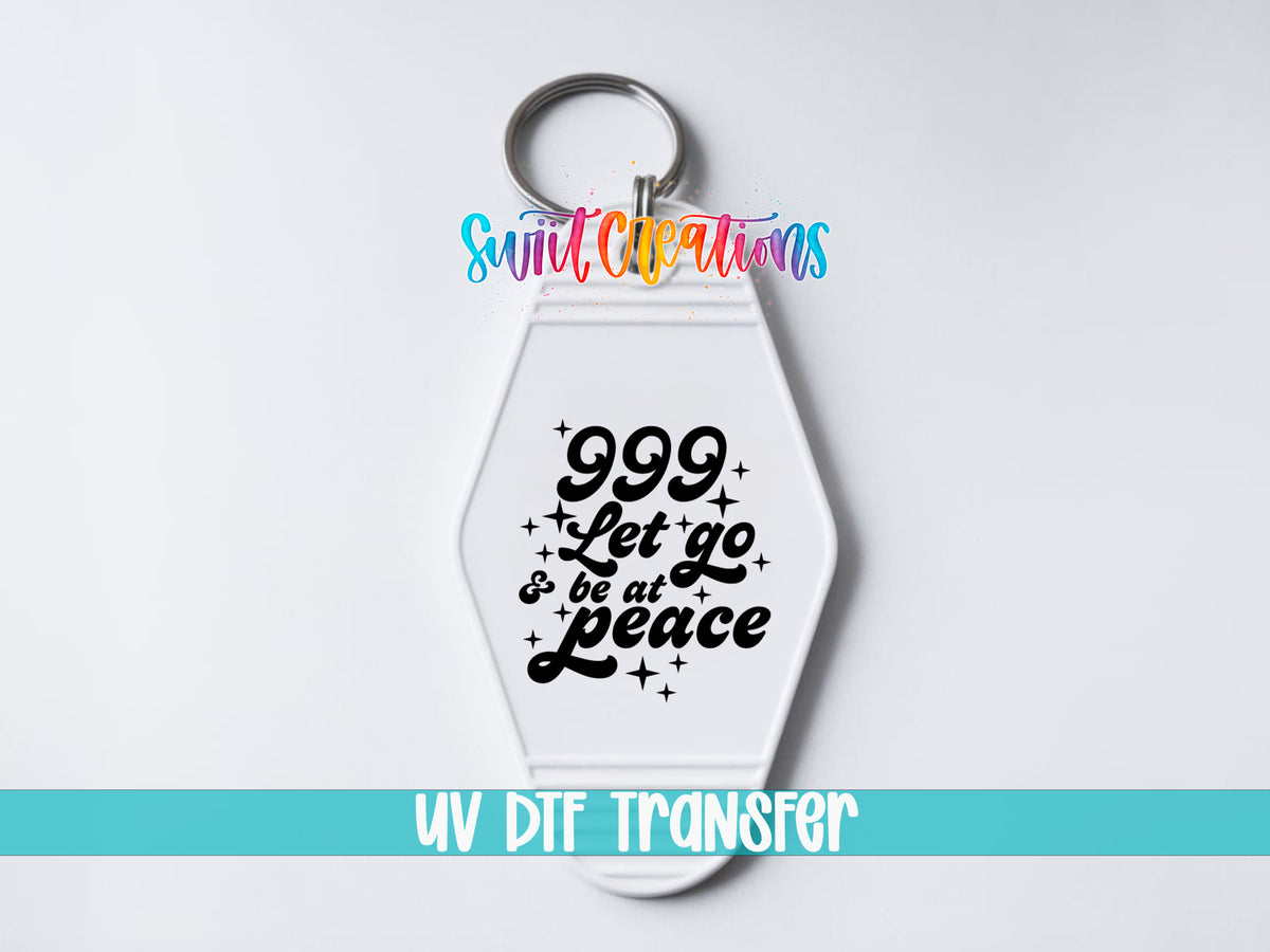 999 Let Go and Be at Peace motel keychain UV DTF transfer close-up mockup by Swiit Creations