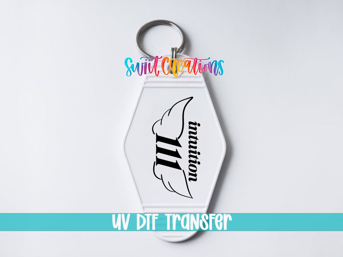111 Intuition motel keychain UV DTF transfer close-up mockup by Swiit Creations