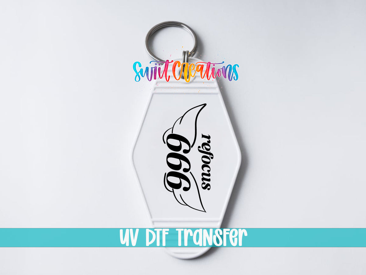 666 Refocus motel keychain UV DTF transfer close-up mockup by Swiit Creations
